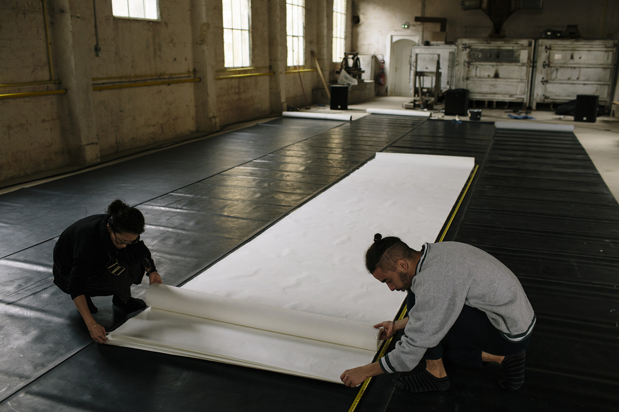 Aoi & Farid preparing the paper _ photo by Corey Fuller